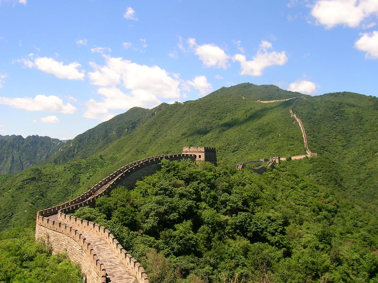 Great Wall of China winding over green hills at Mutianyu