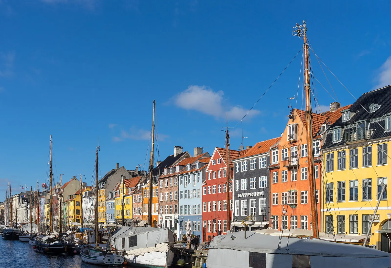 Colourful townhouses and moored boats at Nyhavn, Copenhagen