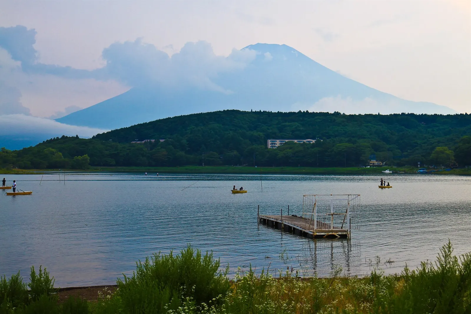 Mount Fuji across Lake Yamanaka with a small wooden pier