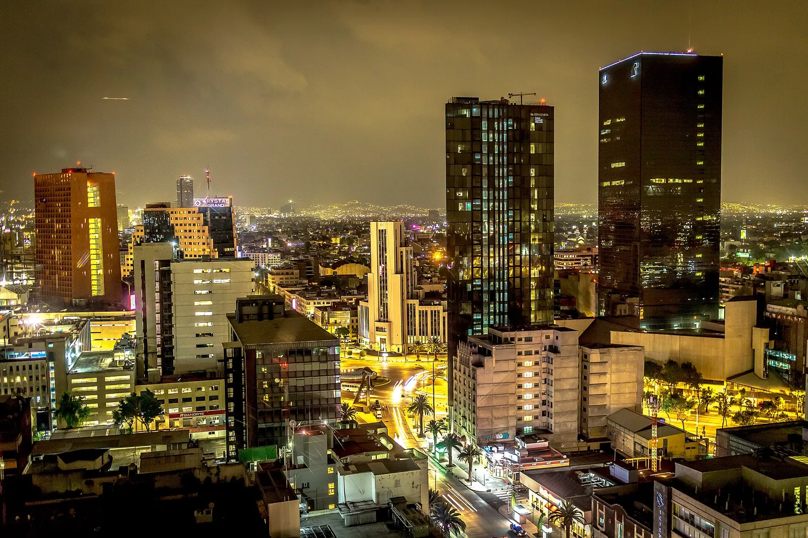 Mexico City skyline glowing at night
