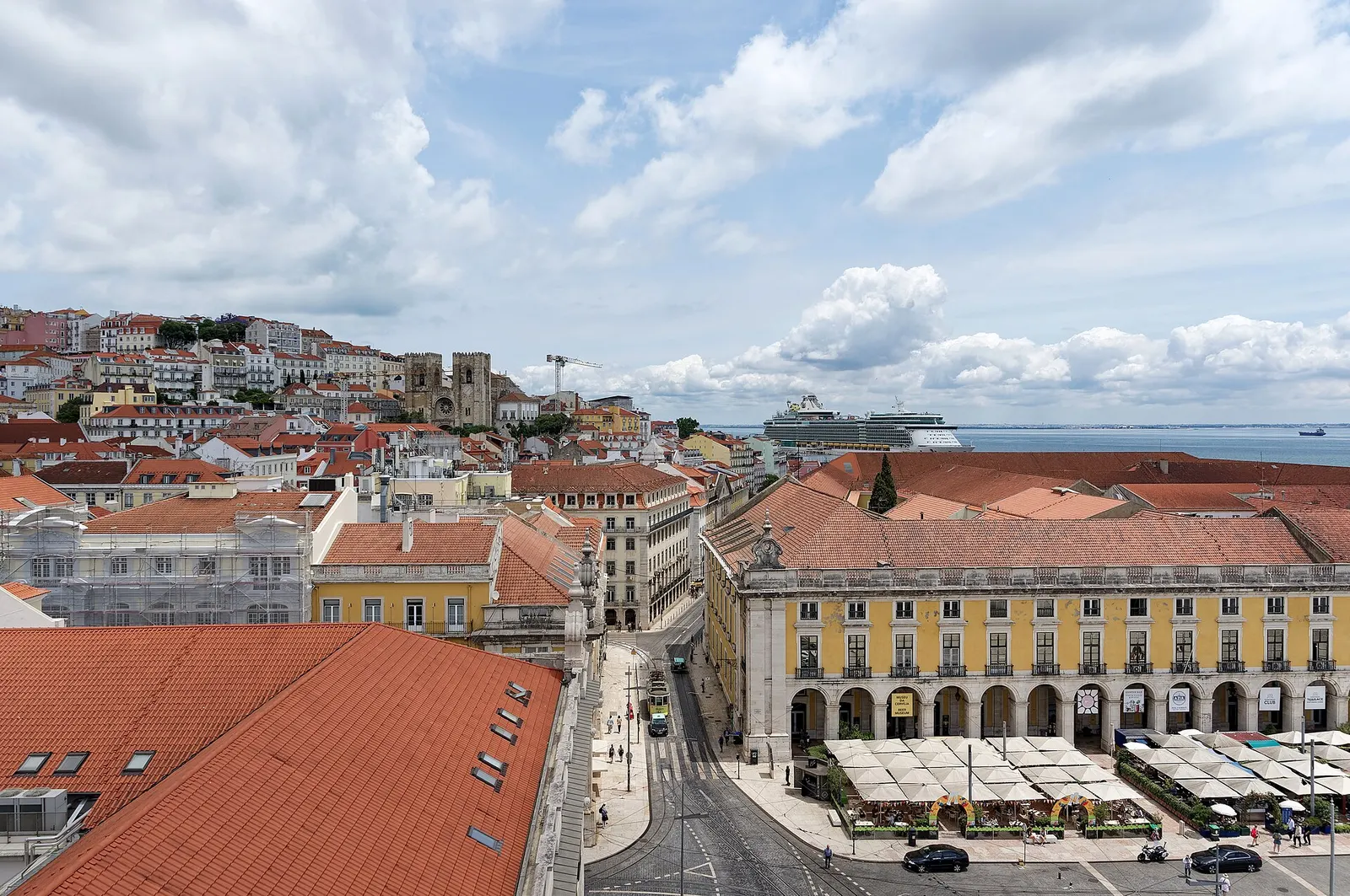Praca do Comercio rooftops and the Tagus seen from the Rua Augusta arch, Lisbon