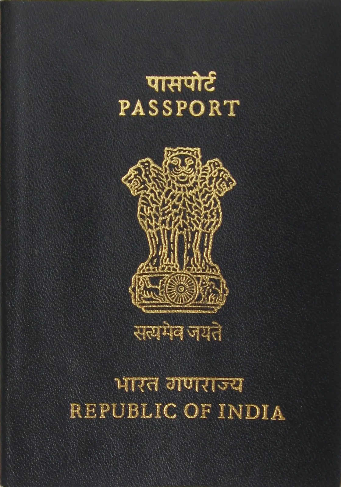 Dark blue Indian passport cover with the Ashoka emblem