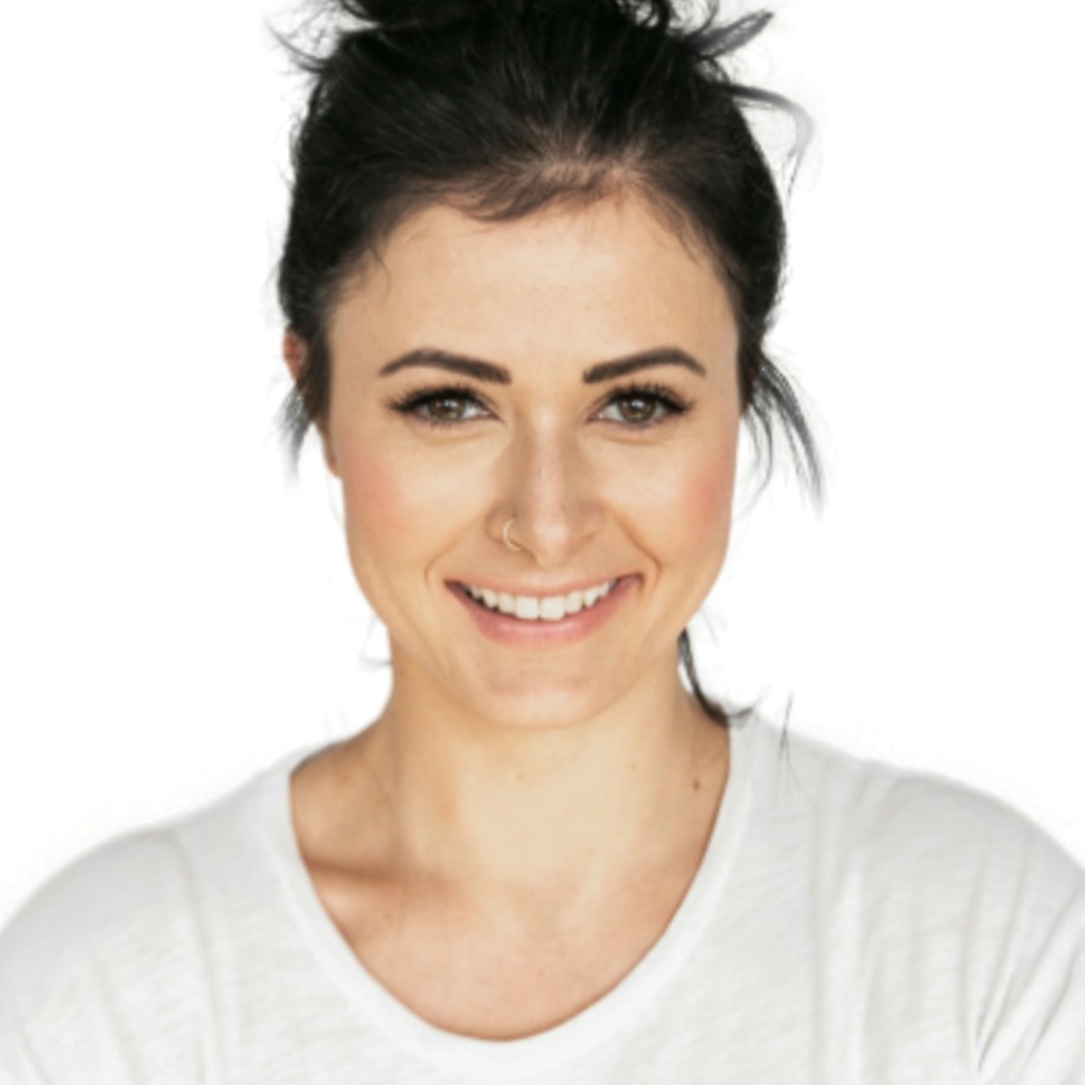 Our crop of the smiling woman in a white crew neck for a US passport, held back because her teeth show in the smile
