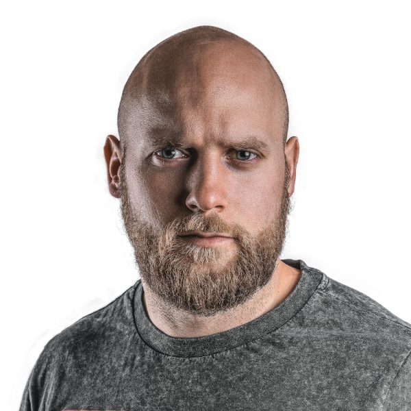 US visa upload file our tool made: bald, bearded man in a grey crew-neck top on a white background