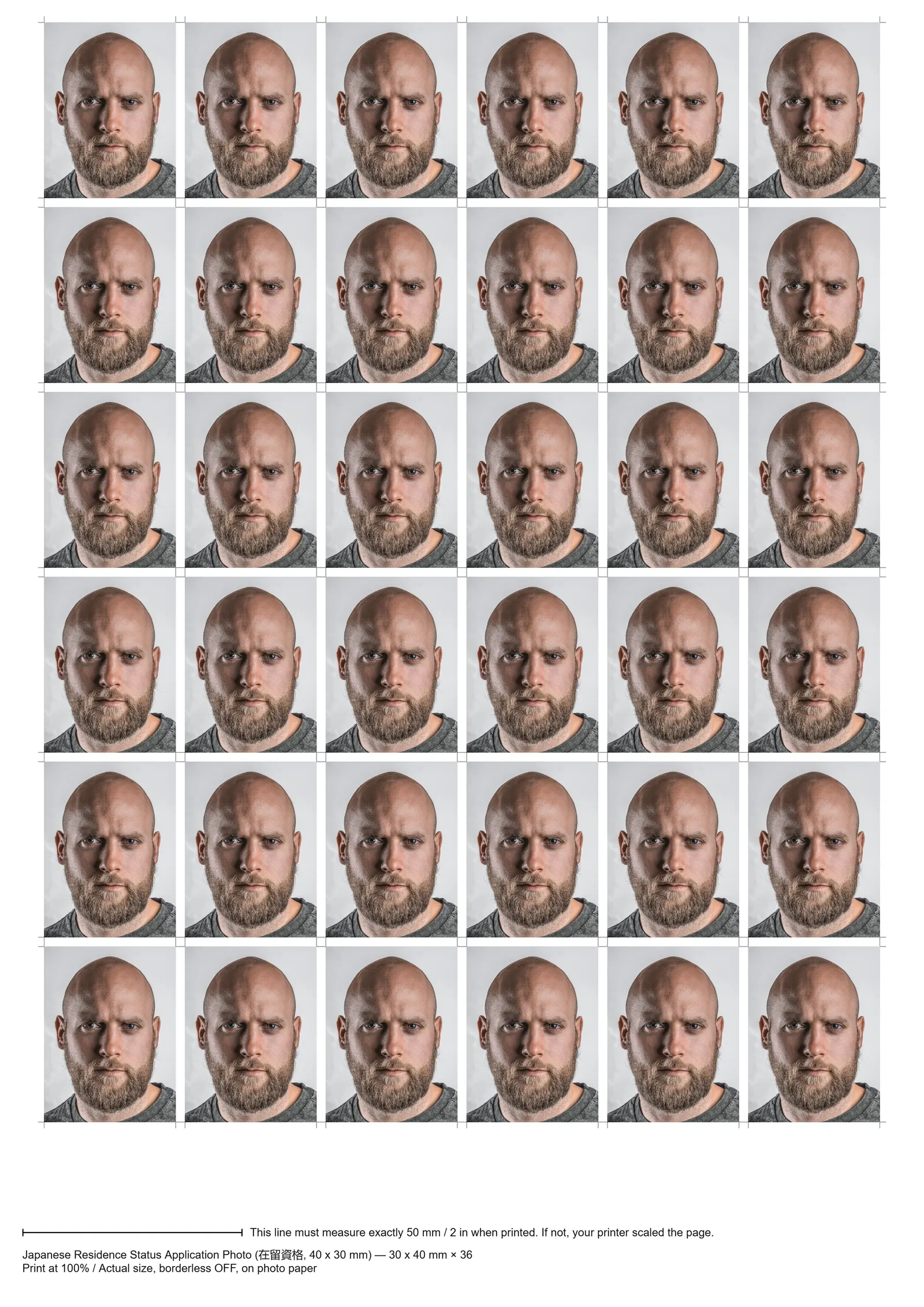 Print sheet our tool made: 30 x 40 mm prints of a demo portrait tiled with cut marks and a 50 mm ruler