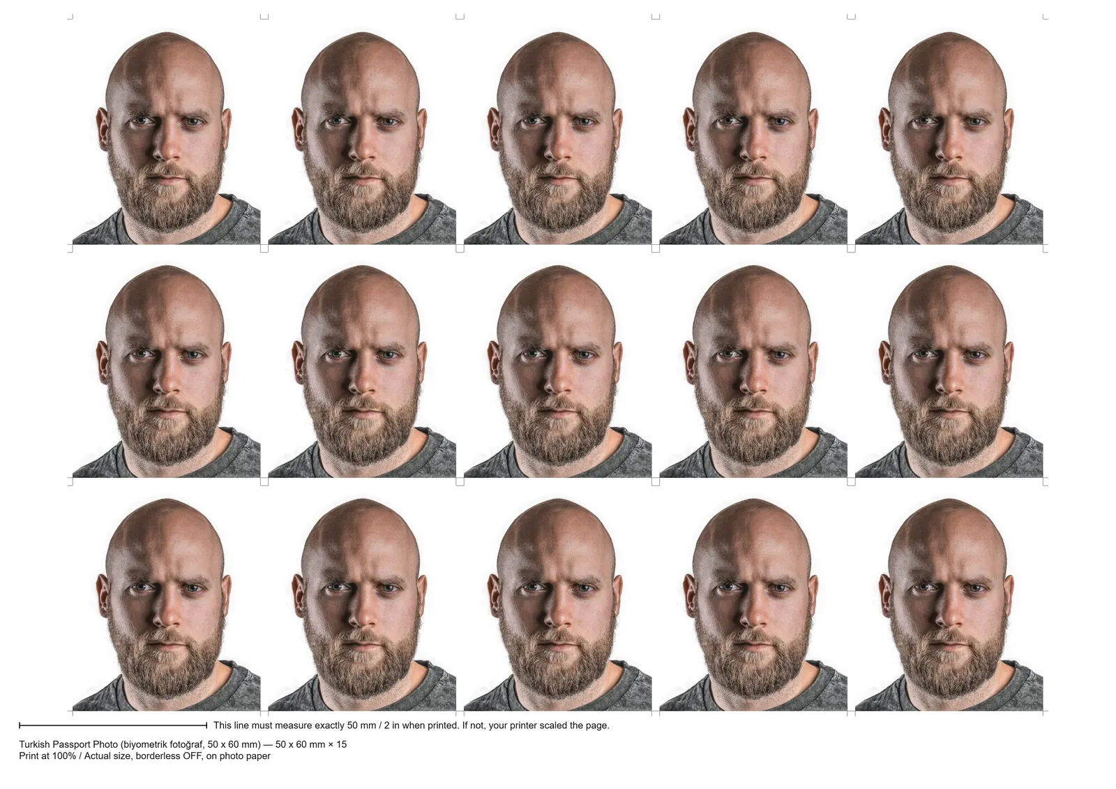 Print sheet our tool made: 50 x 60 mm prints of a demo portrait tiled with cut marks and a 50 mm ruler